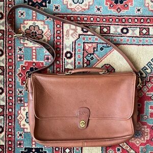Vintage coach briefcase. Brown leather, simple design. Minor discoloration.